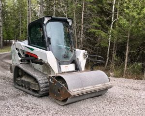 Bobcat Skidsteer with compactor attachment